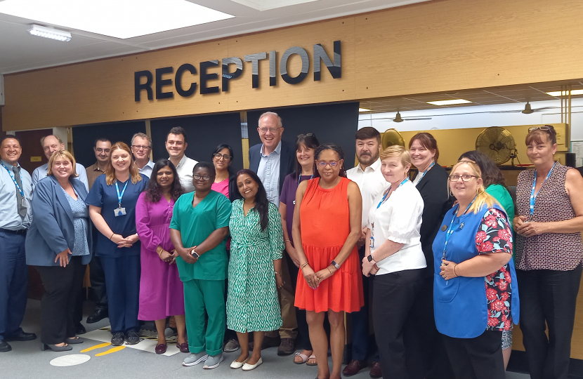 1.	The attached photograph shows John Baron MP with Doctors, Julie Bennett, receptionists, and other members of the team at the Medical Centre.