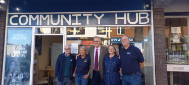 1.	Photo shows John with Phil Norton and the team of volunteers at the Billericay Community Hub. Left to right: Jim Rose, Patsy Hunt, Alison Lodoiska and Phil Norton